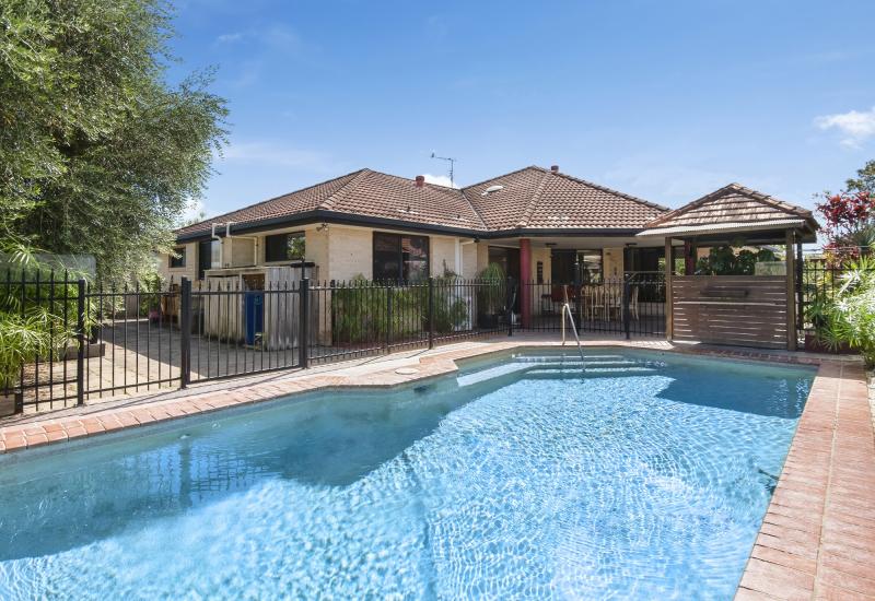 BEAUTIFUL FAMILY HOME IN HIGHLY SOUGHT-AFTER SUBURB PELICAN WATERS