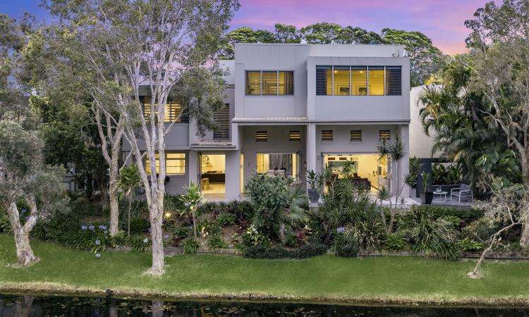 STUNNING LAKE SIDE HOME, ADJACENT TO WORLD CLASS GOLF COURSE