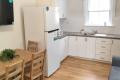 Spacious 3-Bedroom + Sunroom Apartment with Garden