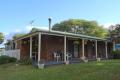 Comfortable Elevated Lowset Brick Home