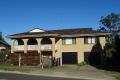 VERY SPACIOUS HIGHSET BRICK HOME