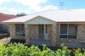 Large low set brick home