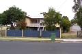 QUEENSLANDER on 1004M2 ( 2 TITLES) ZONED COMMERCIAL