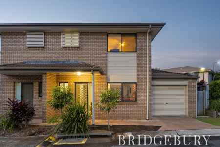 Modern three-bedroom townhouse in Murrumba Downs offering stylish living, private outdoor entertaining, and exceptional convenience.