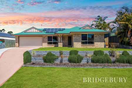 BEAUTIFULLY RENOVATED FAMILY HOME WITH DRIVE THROUGH GARAGE AND SOLAR