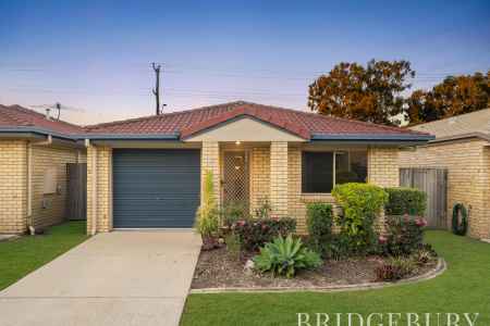 Beautifully Presented Low-Set Home with Solar, Entertaining Area & Resort-Style Facilities