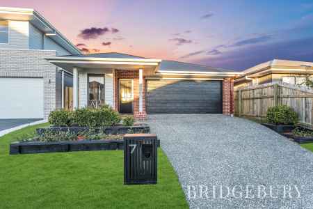 Modern Lowset Home with a study in the Heart of The Capstone Estate