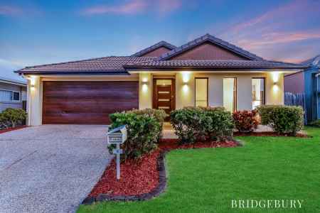  STUNNING FAMILY HOME WITH 3 LIVING AREAS AND HIGH CEILINGS IN THE HEART OF NORTH LAKES