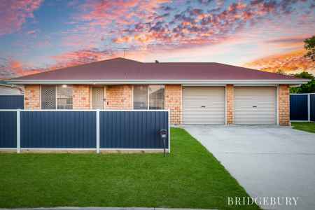 Coastal Living at Its Finest: Beautifully Updated 4-Bedroom Family Home with Side Access