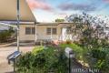 Low-Maintenance Living in the Heart of Woody Point!