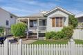 Charming Queenslander Cottage with Ocean Views in Sought-After Aroona!