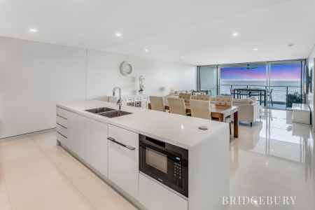 LUXURY APARTMENT WITHIN WATERS EDGE WITH STUNNING VIEWS AND LOW BODY CORPORATE COSTS