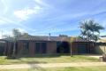 Well-Located Home with Extra Living Space and Outdoor Appeal