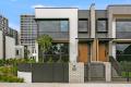 Sought-after Designer Townhouse Facing North