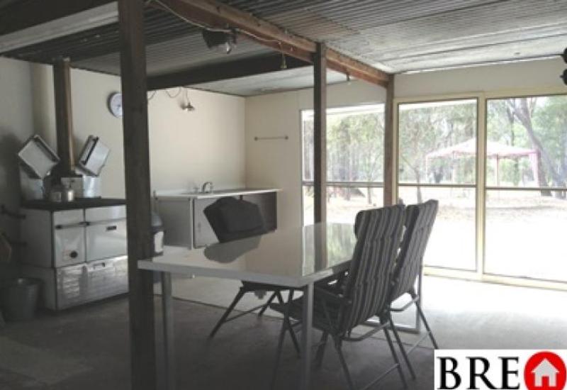 Weekend Dwelling on about 100 Acres with Machinery