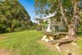 MOTIVATED SELLER - Two Story Queenslander on cleared acreage. Lifestyle and mountain views with a gorgeous hidden creek surrounded by tall tree ferns