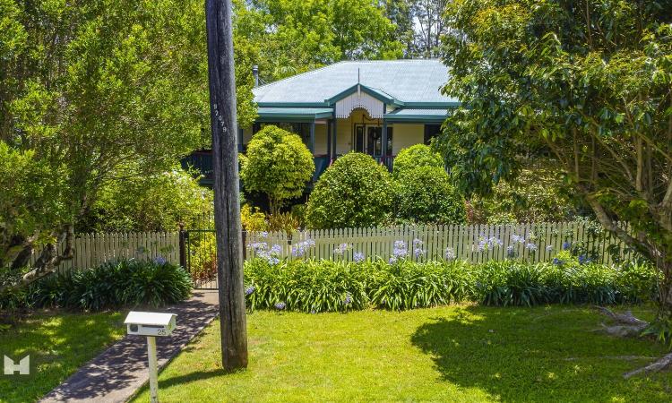 Gorgeous 4 bedroom Queenslander surrounded by fragrant and well manicured gardens