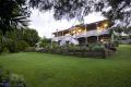 MODERN CLASSIC "QUEENSLANDER" ON PRIVATE PARK-LIKE 1500m2