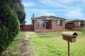 Charming Single-Level Brick Home on Corner Block