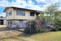 3 bedroom highset renovator beachside home with 3 bay shed - close to beach