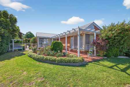 A Private Garden Sanctuary with Expansive Outlooks