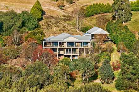 A One-of-a-Kind Retreat with Clifton Creek Frontage