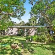 A confident and knowledgeable agent.