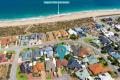 "Beachside Bliss – Spacious Family Retreat Just 150m from the Shore!"