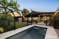 ONE-OF-A-KIND DESIGNER HOME IN BEAUTIFUL MADORA BAY