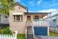 SPACIOUS QUEENSLANDER FAMILY HOME WITH MODERN UPGRADES!