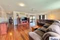 Expansive, renovated family home with mixed-use zoning, offering residential comfort, commercial opportunities, and stunning river and mountain views.