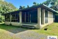 Master-Built Tropical Retreat in a Private Pocket
