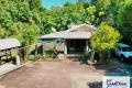 Tropical Retreat with Shed, Creek & Rainforest Backdrop