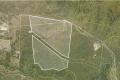 Over 150 acres of untouched buhsland for sale