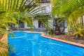 Coastal Living at Its Finest – Stunning Three-Level Home Metres from the Surf
