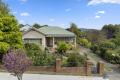 Charming Art Deco Brick Home with Mountain Views in Corryong!