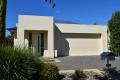 Cleverly Designed with the Main Living Areas & Brms at the Rear - Very Private, Secure & Low Maintenance!
