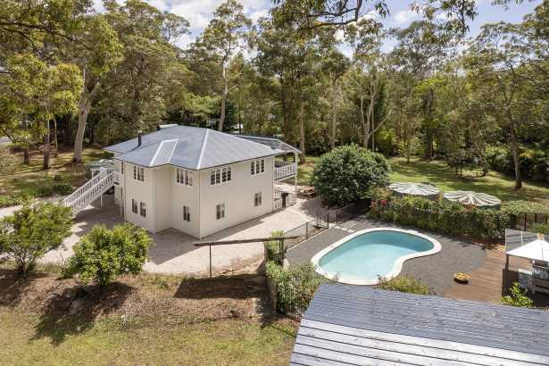 CHARACTER FILLED FAMILY HOME ON LEVEL ACREAGE.