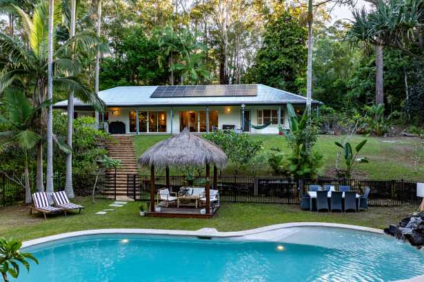 ELEVATED DOONAN RETREAT WITH FIREPLACE, POOL & HINTERLAND VIEWS