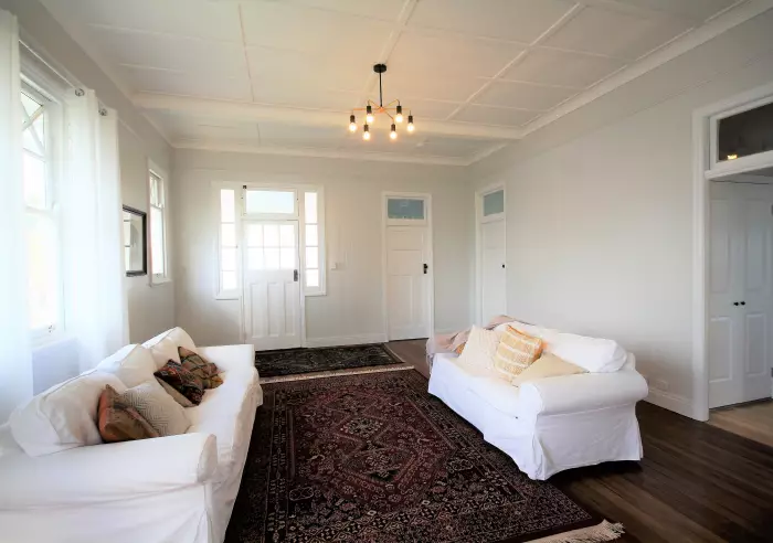 Formal living room with lovely windows and polished floor