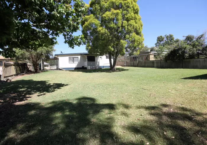 Back fence looking to house