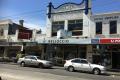 SYDNEY ROAD FRONTING BUILDING IN THE CENTRE OF BRUNSWICK RETAIL PRECINCT