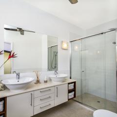 En-suite with walk-in shower, twin vanities and ceiling fan
