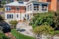 A Versatile Character Home With Modern Updates And Expansive Views!