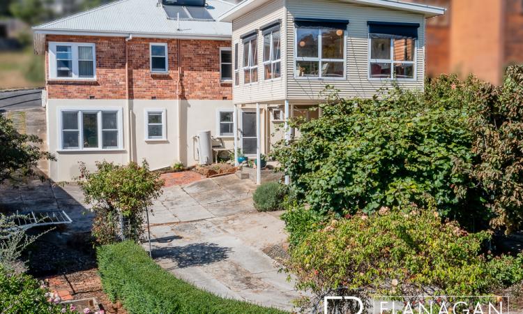 A Versatile Character Home With Modern Updates And Expansive Views!