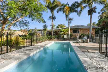 The perfect acreage retreat, sparkling pool with stunning backdrop!