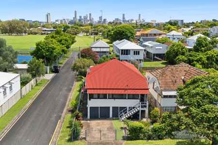 Original 1920’s Queensland Character with City Views + Side Access – Unlimited Potential!