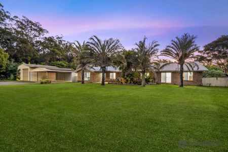 ACREAGE FAMILY HOME WITH MULTIPLE SHEDS & ROOM FOR THE WHOLE FAMILY TO GROW