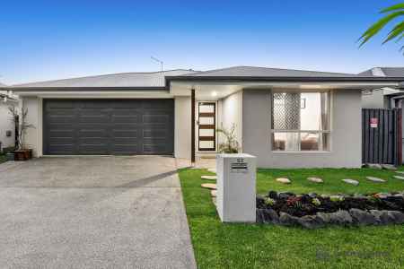 LOW MAINTENANCE HOME WITH SAUNA + SPA IN THE EVER POPULAR CENTRAL SPRINGS ESTATE!