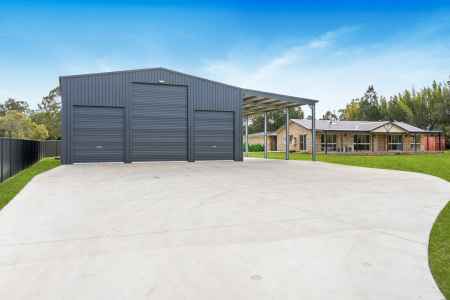 Fully Renovated Oasis on Spacious Acreage